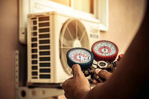 Professional Furnace Repair technician working in Norvell, MI